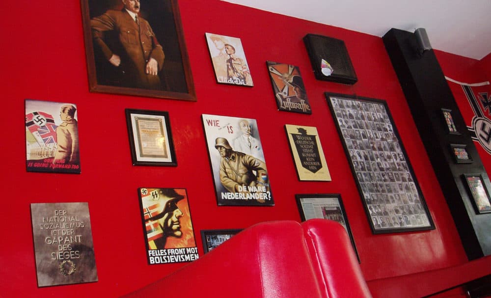 This 2013 photo shows Nazi-related memorabilia hanging on a wall at Soldatenkaffe restaurant in Bandung, West Java, Indonesia. (AP)