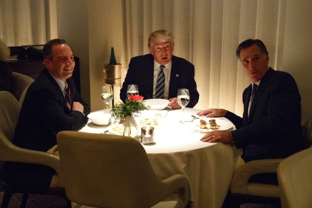 Donald Trump, center, eats dinner with Mitt Romney, right, and Reince Priebus at Jean-Georges restaurant, Tuesday, Nov. 29, 2016, in New York. (Evan Vucci/AP)