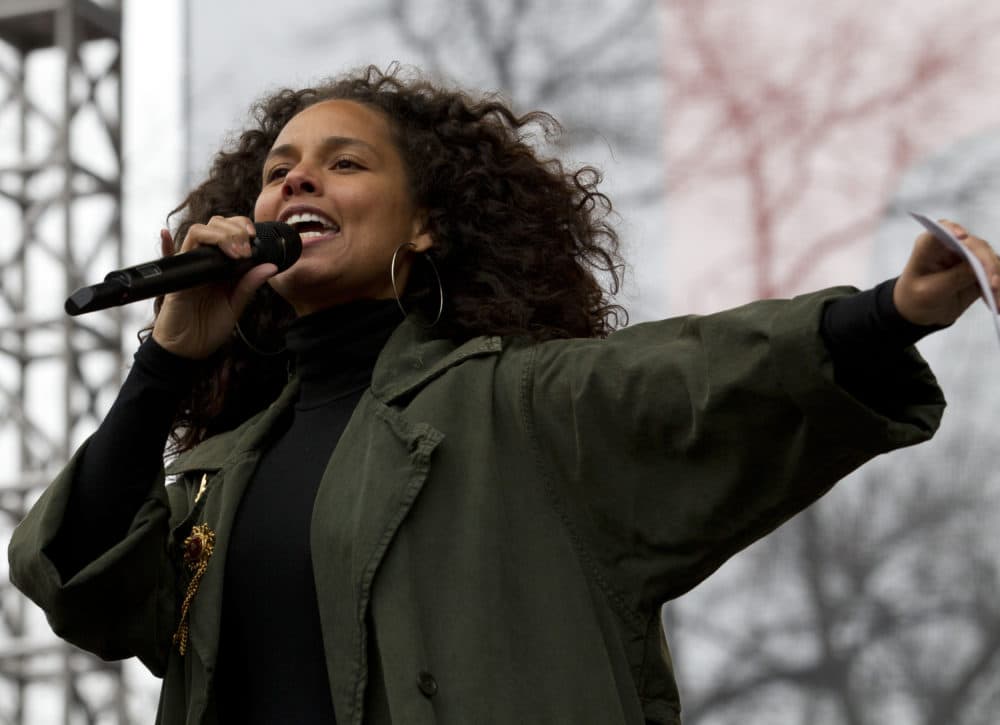 Alicia Keys performs on stage during the women's march rally, Saturday, Jan. 21, 2017 in Washington. Organizers of the Women's March on Washington expect more than 200,000 people to attend the gathering. Other protests are expected in other U.S. cities. ( AP Photo/Jose Luis Magana)