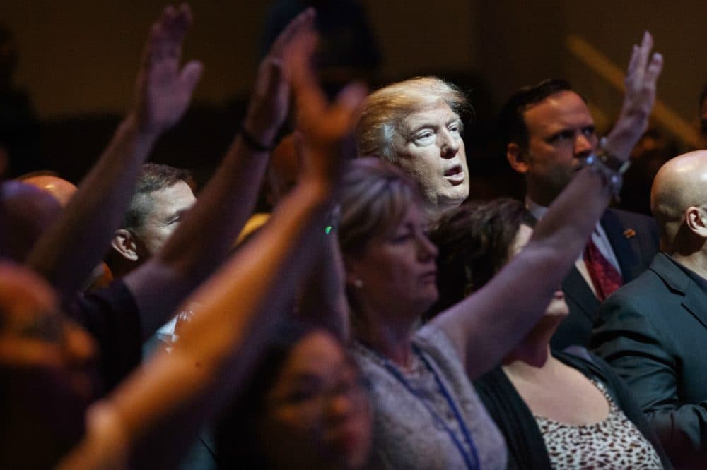Donald Trump stands during a service at  the International Church of Las Vegas, Sunday, Oct. 30, 2016, in Las Vegas. (Evan Vucci/AP)