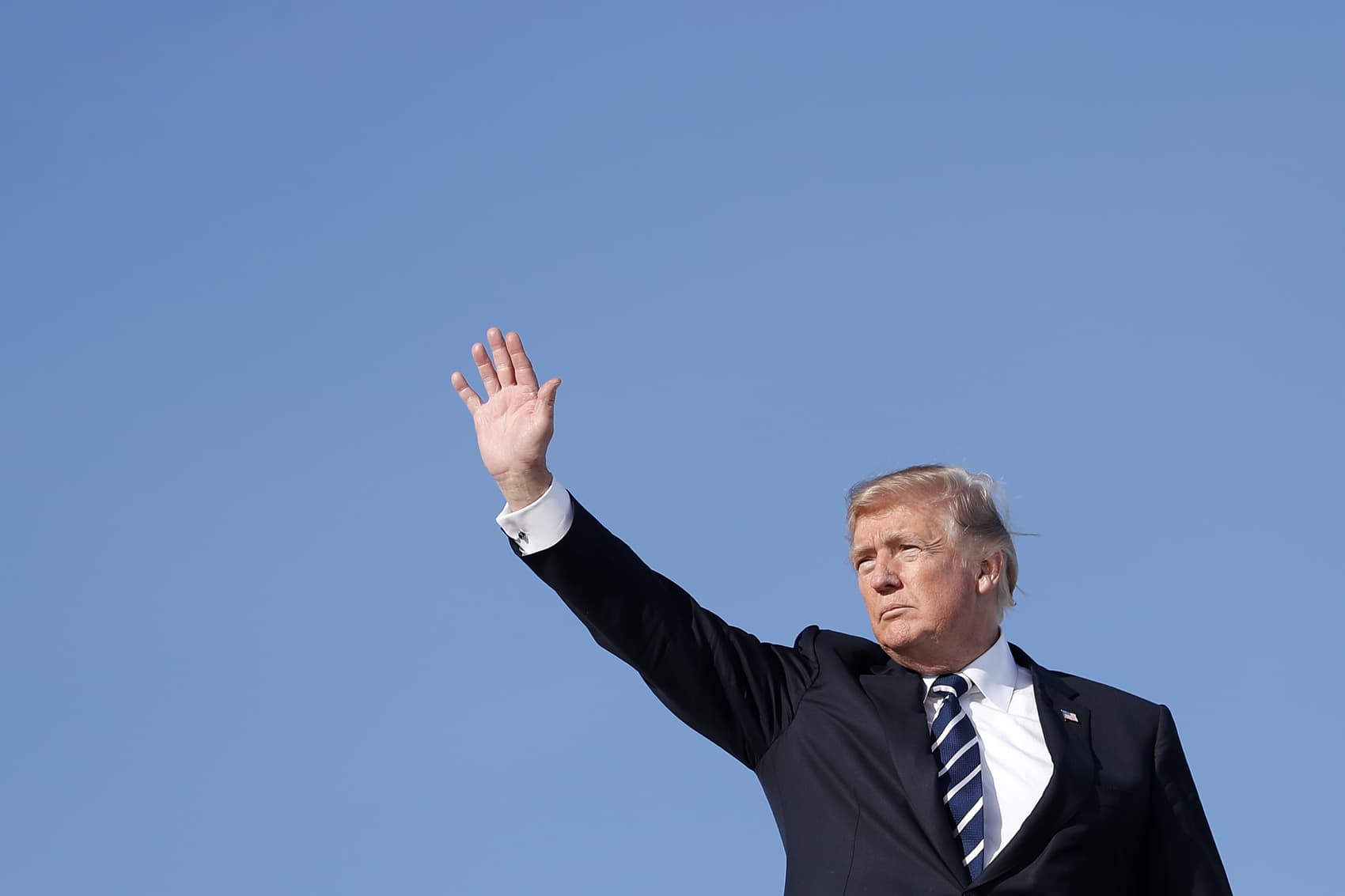 President Donald Trump waves as he boards Air Force One, Monday, Oct. 16, 2017, in Andrews Air Force Base, Md., en route Greenville, S.C., for a fundraiser for South Carolina Gov. Henry McMaster. (Carolyn Kaster/AP)