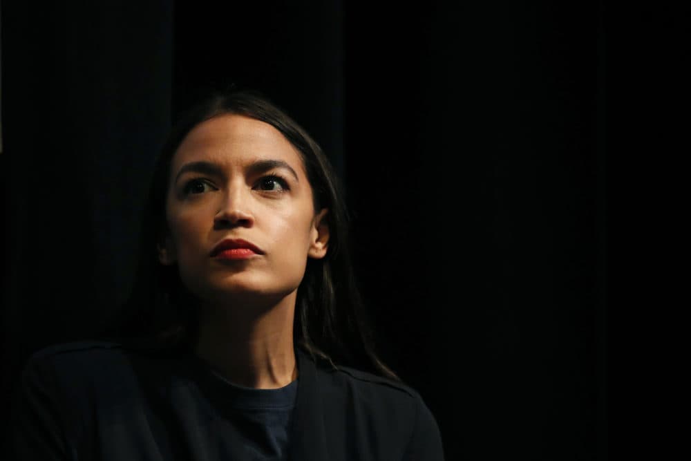 Alexandria Ocasio-Cortez listens to a speaker at a fundraiser Thursday, Aug. 2, 2018, in Los Angeles. (Jae C. Hong/AP)