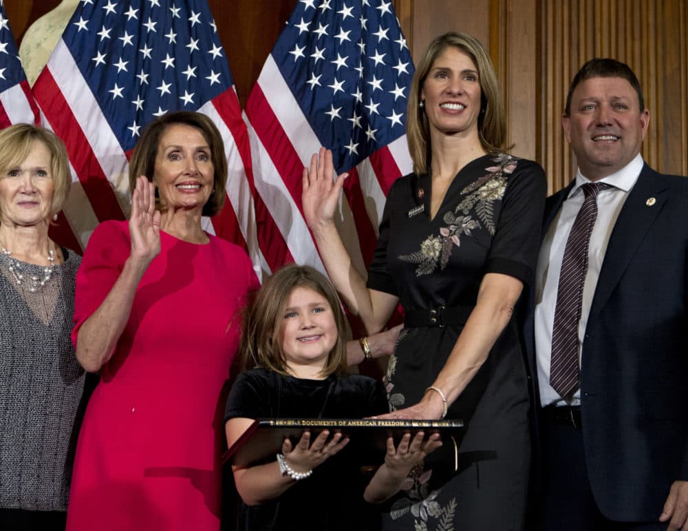 House Speaker Nancy Pelosi administers the oath of office to Rep. Lori Trahan, D-Mass. (Jose Luis Magana/AP)