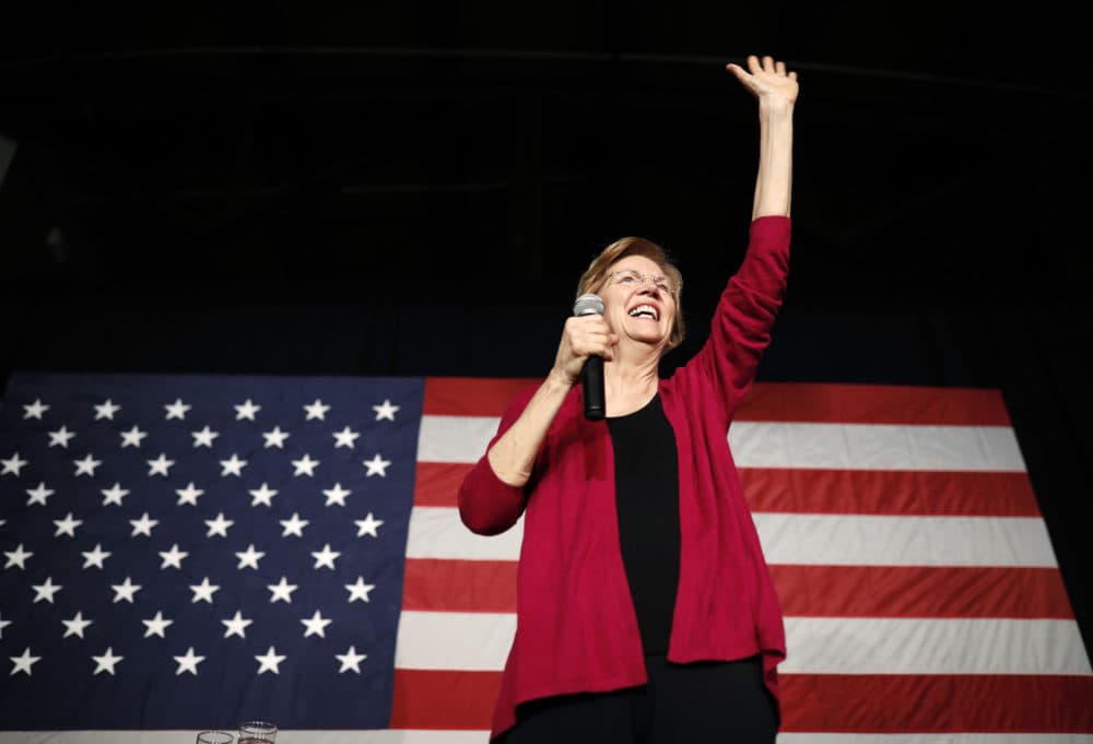 Sen. Elizabeth Warren, D-Mass, waves to the crowd during an organizing event at Curate event space in Des Moines, Iowa, Saturday, Jan. 5, 2019. (Matthew Putney/AP)