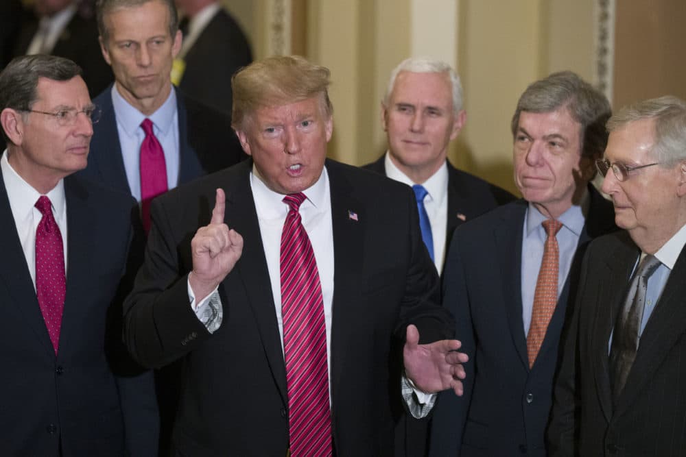 Sen. John Barrasso, R-Wyo., left, and Sen. John Thune, R-S.D., stand with President Donald Trump, Vice President Mike Pence, Sen. Roy Blunt, R-Mo., and Senate Majority Leader Mitch McConnell of Ky., as Trump speaks while departing after a Senate Republican Policy luncheon, on Capitol Hill in Washington, Wednesday, Jan. 9, 2019. (Alex Brandon/AP)