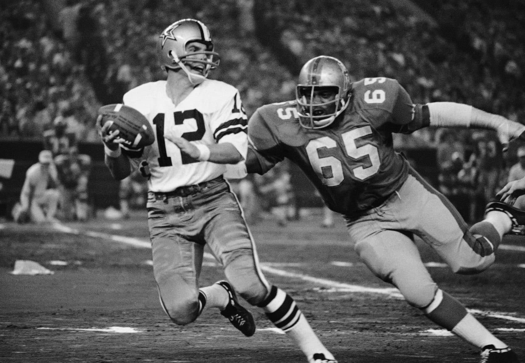 "We're not asking for the moon," Hall of Famer Elvin Bethea (65) says. "Just a little more assistance." (Ed Kolenovsky/AP)