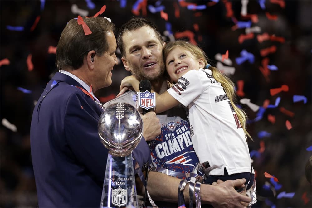 New England Patriots' Tom Brady holds his daughter, Vivian, after the NFL Super Bowl 53 football game against the Los Angeles Rams in 2019. The Patriots won 13-3. (Mark Humphrey/AP)