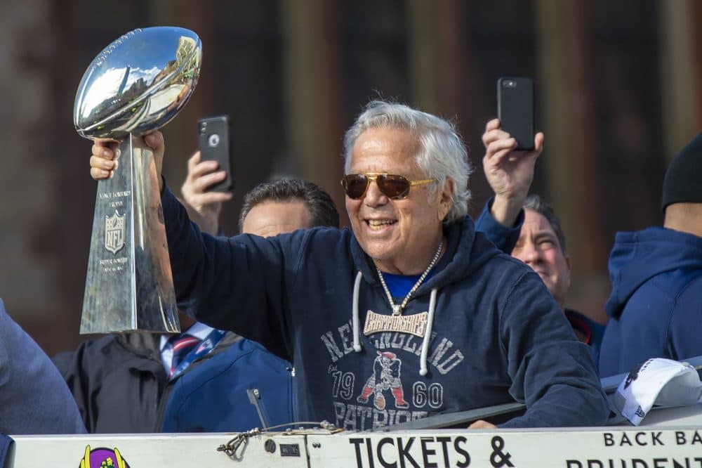 Patriots owner Robert Kraft hoists a Lombardi trophy. (Jesse Costa/WBUR)