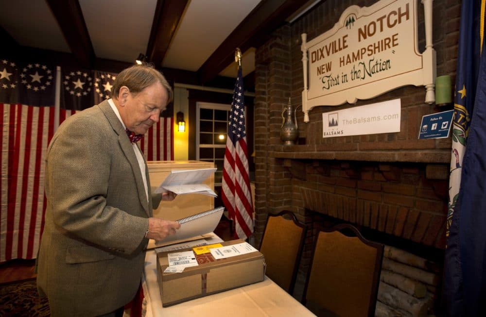 Town moderator Tom Tillotson arrives with ballots on Nov. 7, 2016, for voters in Dixville Notch to cast their ballots at midnight. (Jim Cole/AP)