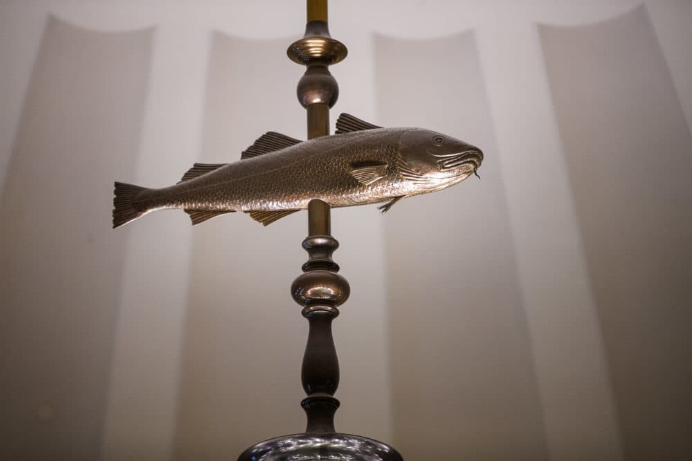 The “Holy Mackerel&quot; sits atop the chandelier and was in good shape ahead of the renovations. It only needed some cleaning. (Jesse Costa/WBUR)
