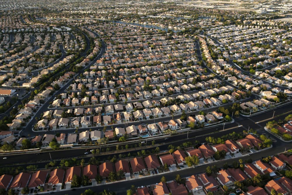 Houses line streets near the edge of the Las Vegas valley in Las Vegas. (John Locher/AP)