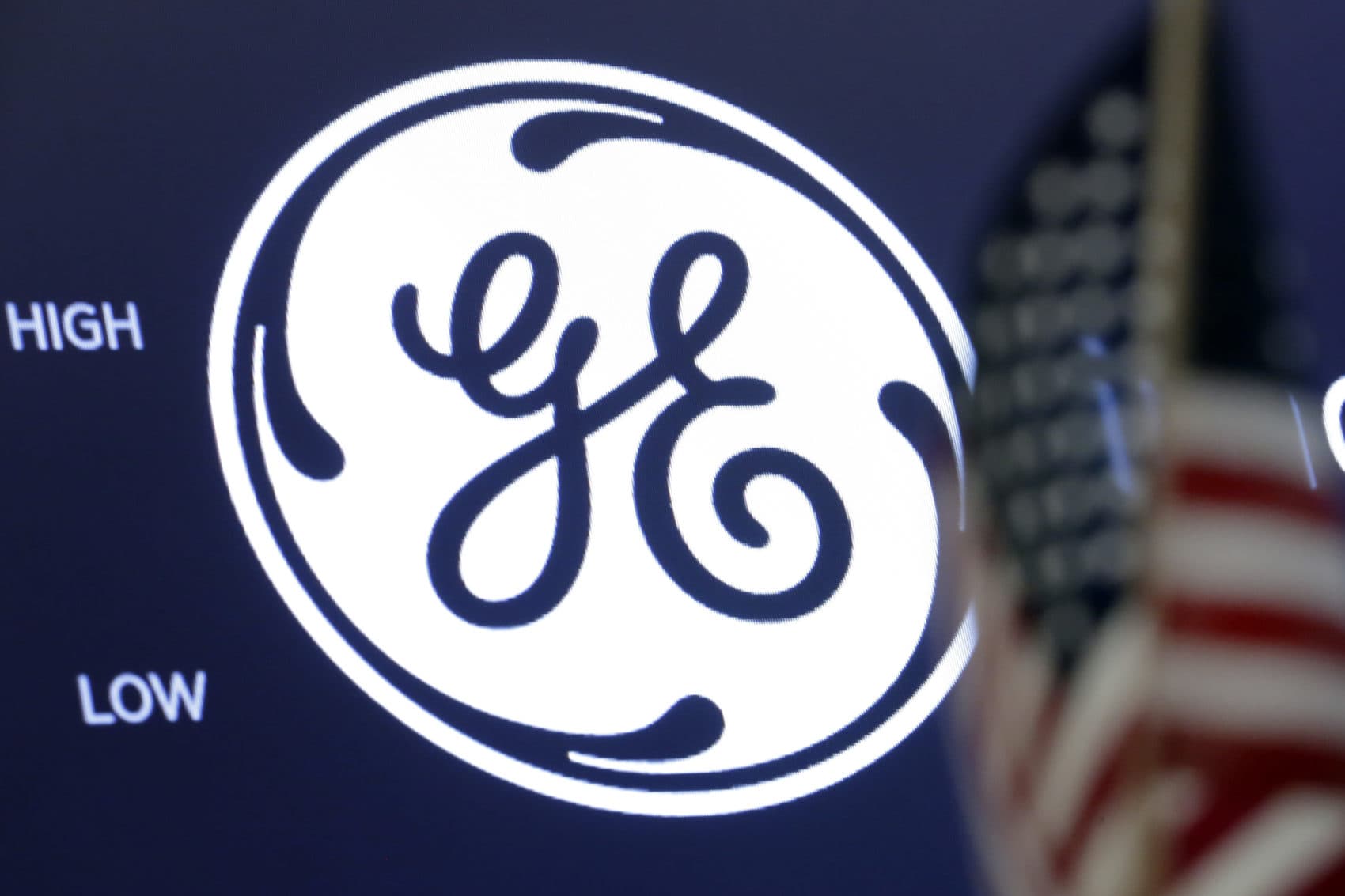 The General Electric logo appears above a trading post on the floor of the New York Stock Exchange. (Richard Drew/AP)