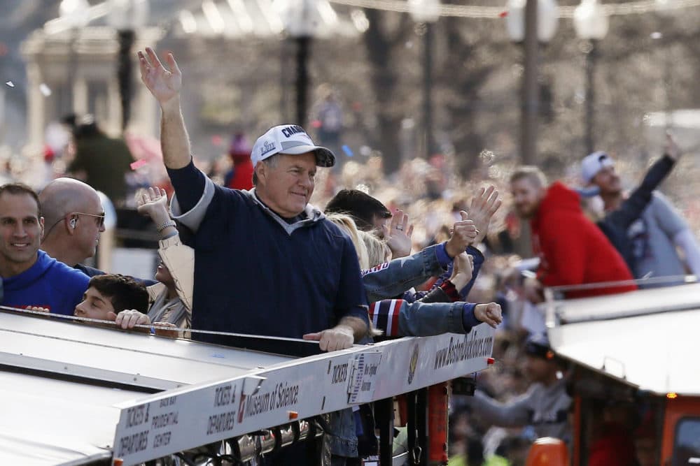 Bill Belichick waves to the crowd. (Michael Dwyer/AP)