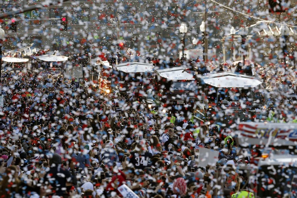 The New England Patriots parade makes its way through downtown Boston after the team won Super Bowl LIII. (Michael Dwyer/AP)