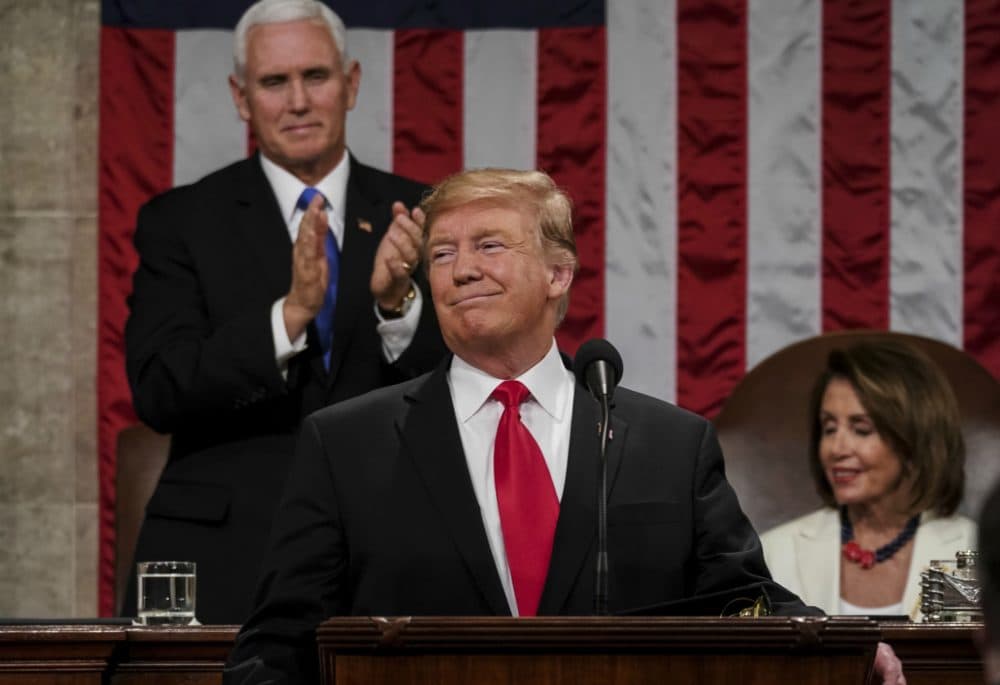 President Trump delivers the State of the Union address, with Vice President Mike Pence and Speaker of the House Nancy Pelosi behind. (Doug Mills/AP)