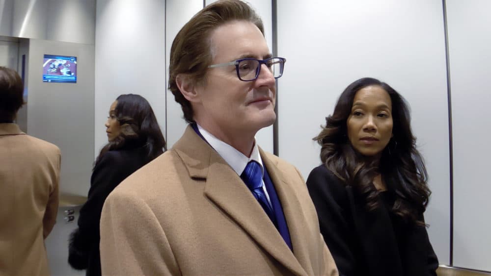 Kyle MacLachlan as David Seton and Sonja Sohn as Myra in &quot;High Flying Bird,&quot; directed by Steven Soderbergh. (Courtesy Peter Andrews/Netflix)