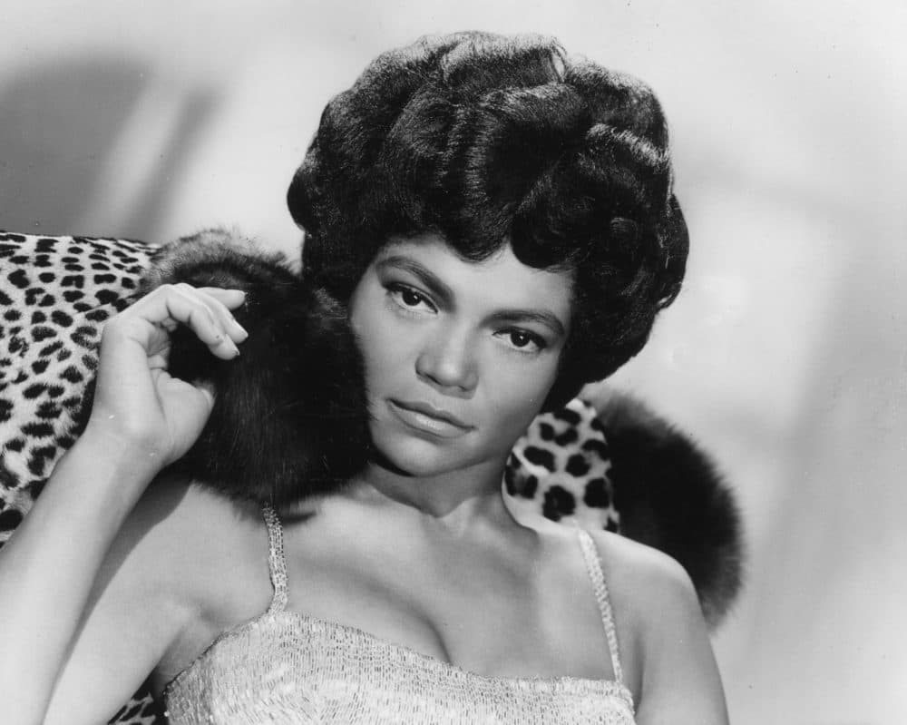 American singer and actress Eartha Kitt decked in leopard skin and furs in Sept. 1960 for her London stage show 'Talk of the Town', a 45-minute programme of old and new numbers. (Courtesy Central Press)