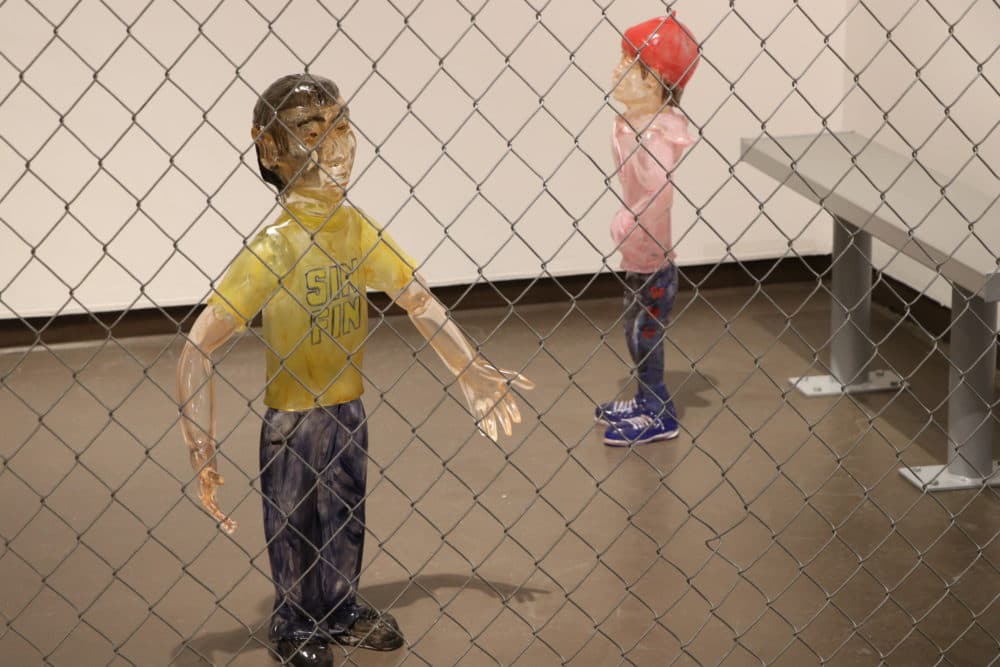 Two of Jaime Guerrero's glass children. (Courtesy Fuller Craft Museum)