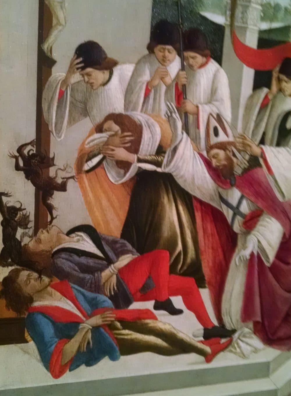 Zenobius exorcising devils in Botticelli's &quot;Three Miracles of Saint Zenobius,&quot; on loan from the National Gallery in London. (Lloyd Schwartz for WBUR)
