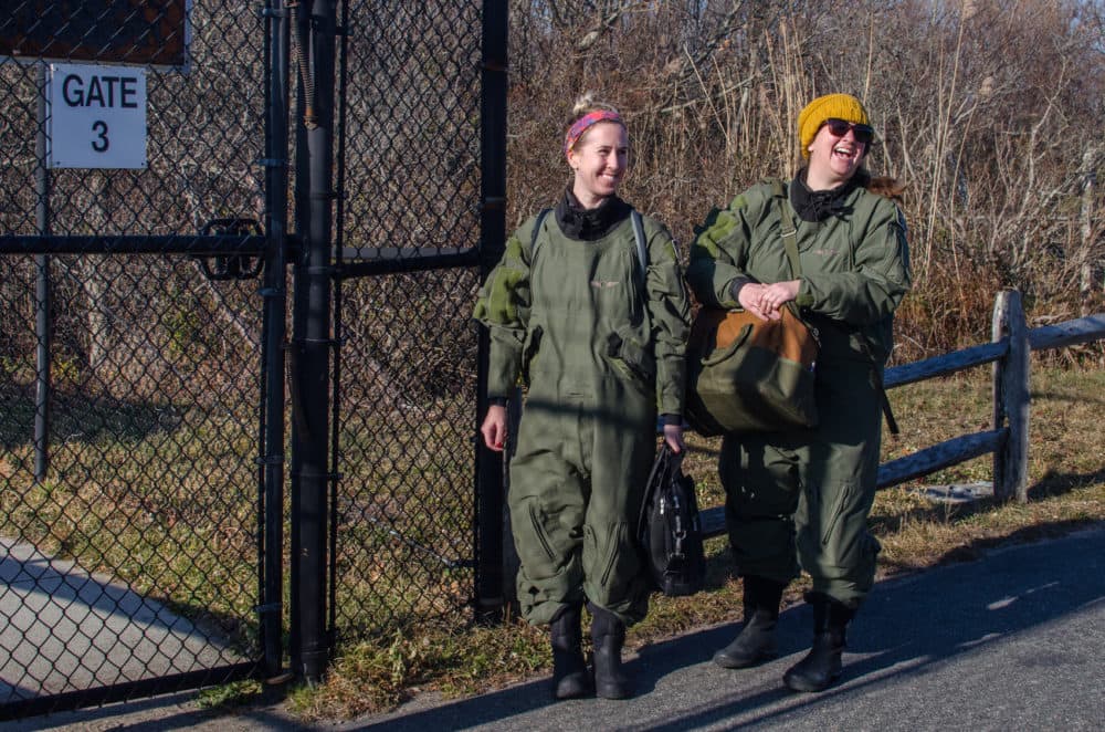 Brigid McKenna and Amy James wait to board their plane at the Provincetown Municipal Airport (Sharon Brody/WBUR)