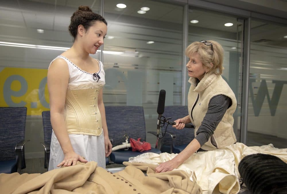 Quinn Burgess, left, in corset she made, talks with Here &amp; Now's Robin Young. (Robin Lubbock/WBUR)