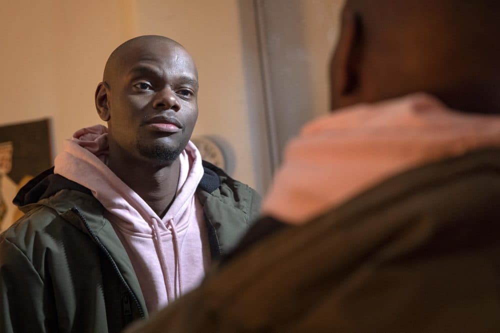 Tory Bullock at his apartment in Mission Hill, Boston. (Robin Lubbock/WBUR)