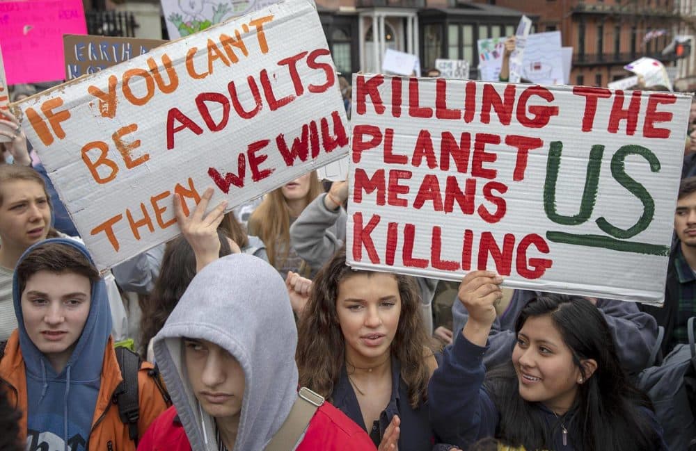 Students from Northampton High School campaign at the Massachusetts Youth Climate Strike. (Robin Lubbock/WBUR)