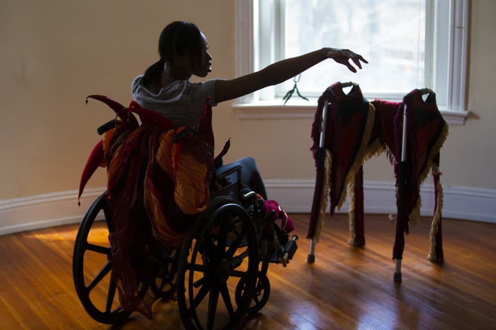 Ellice Patterson dances in a wheelchair at her studio in Brookline. (Jesse Costa/WBUR)