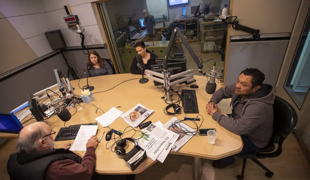 From left: Laurene Trio of Medford, Keri Rodrigues of Medford and Rodolfo Aguilar of Hyde Park speak with Bob Oakes in the studio. (Jesse Costa/WBUR)