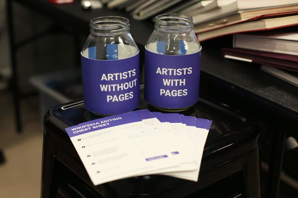 Participants at the ICA's Edit-A-Thon selected names of female and non-binary identifying artists out of jars, and then worked to build or edit their Wikipedia pages. (Hadley Green for WBUR)