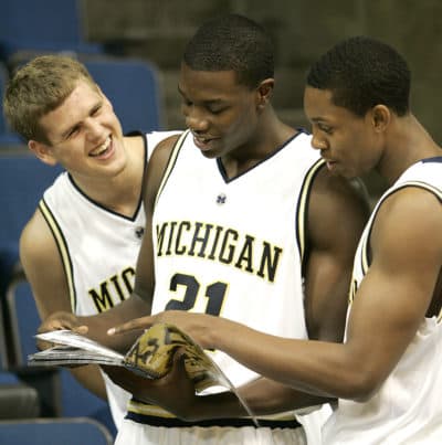 Kendric Price, center, with other University of Michigan basketball players, in this 2006 file photo (Paul Sancya/AP)