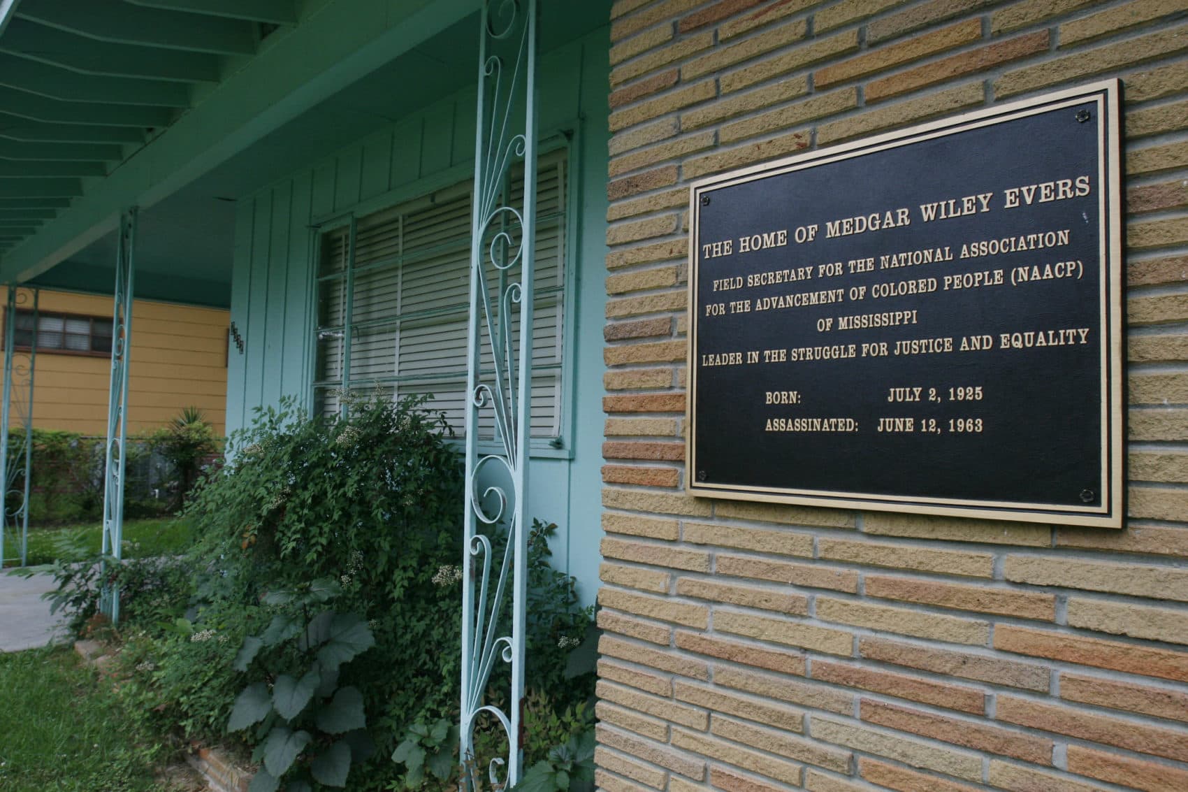 A plaque decorates the front of the home of the late civil rights activist Medgar Evers in Jackson, Miss. (Rogelio V. Solis/AP)