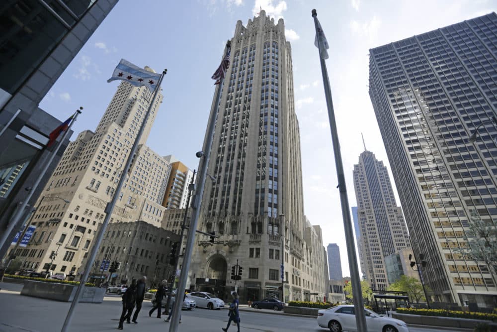 The Chicago Tribune Tower, center, can be seen on Michigan Avenue, Monday, April 25, 2016, in Chicago, Ill. (M. Spencer Green/AP)