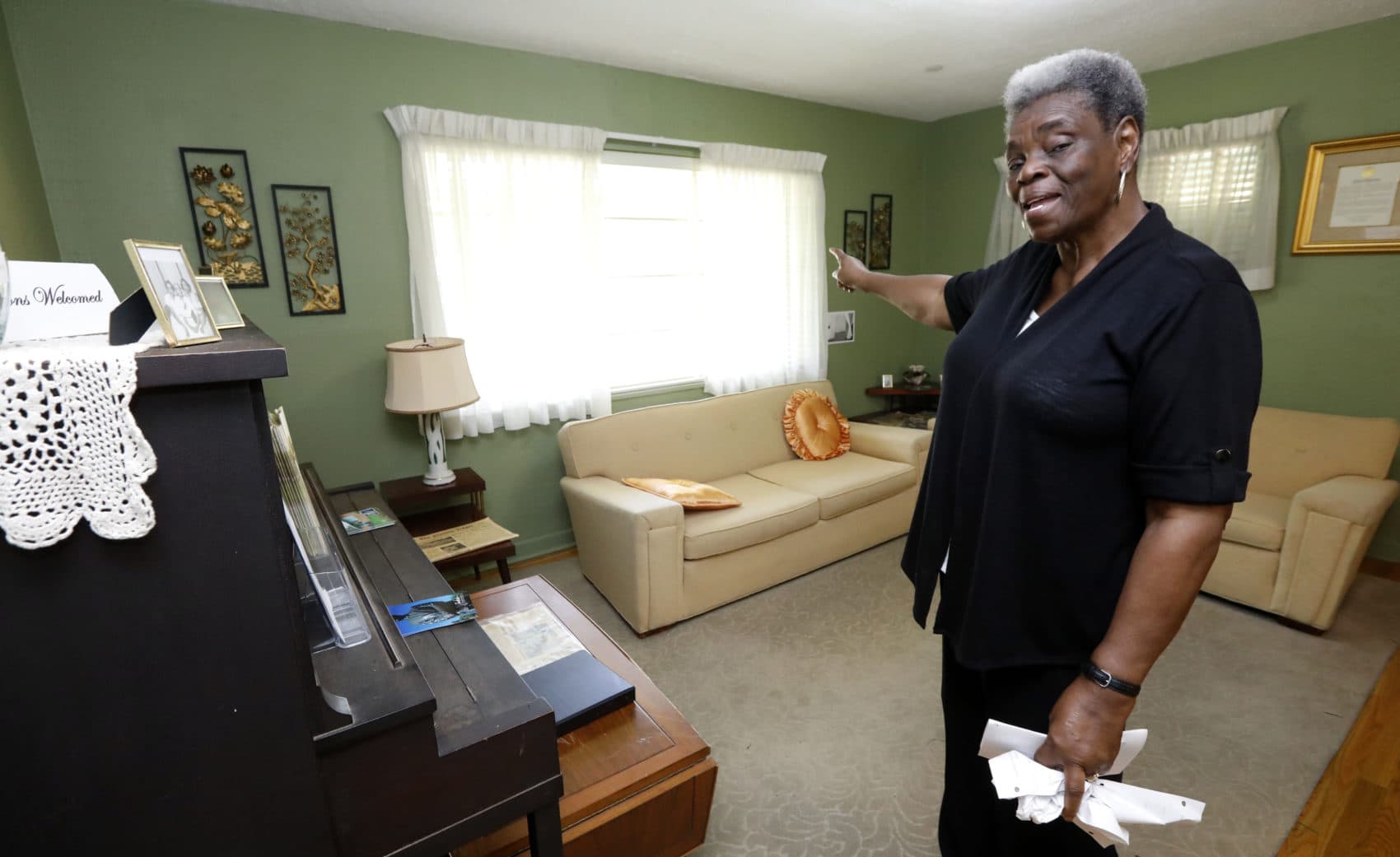 Minnie White Watson, curator of the Medgar and Myrlie Evers house in Jackson, Miss., speaks about the various times when the house was shot at, Thursday, May 24, 2018 in Jackson, Miss. (Rogelio V. Solis/AP)