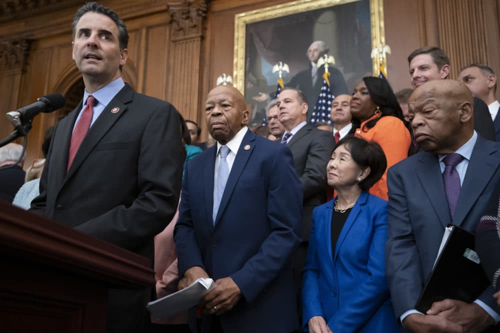 Rep. John Sarbanes, D-Md., left, chairman of the House Democracy Reform Task Force, as House Democrats unveil a comprehensive elections and ethics reform package that targets what they call a &quot;culture of corruption in Washington.&quot; (J. Scott Applewhite/AP)