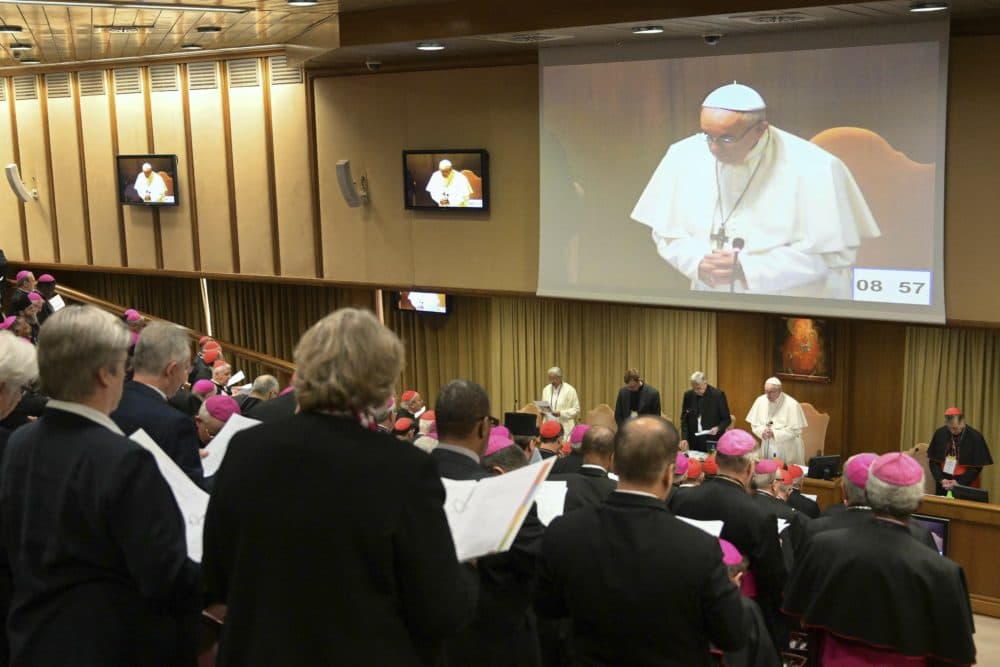 Pope Francis, standing at the bottom second from right, prays at the start of a sex abuse prevention summit, at the Vatican, Thursday, Feb. 21, 2019. (Vincenzo Pinto/AP)