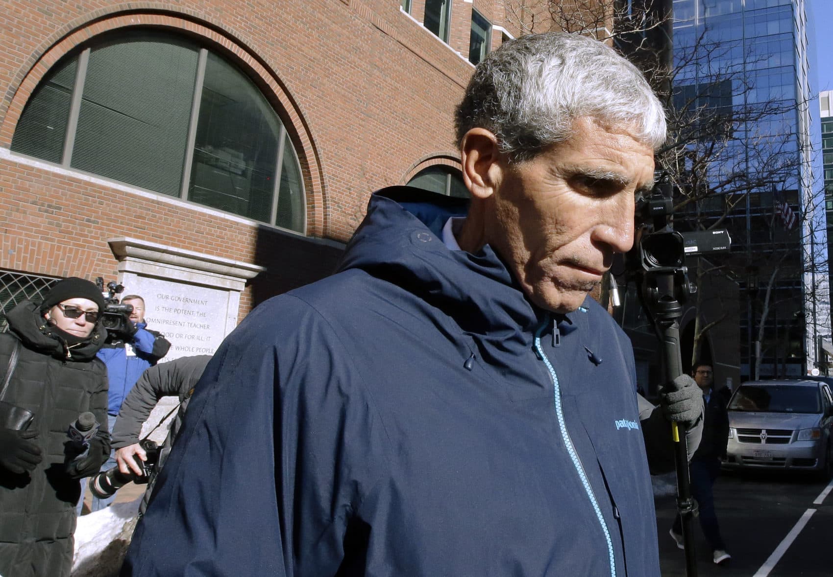 William "Rick" Singer founder of the Edge College & Career Network, departs federal court in Boston on Tuesday, March 12, 2019, after he pleaded guilty to charges in a nationwide college admissions bribery scandal. (Steven Senne/AP)