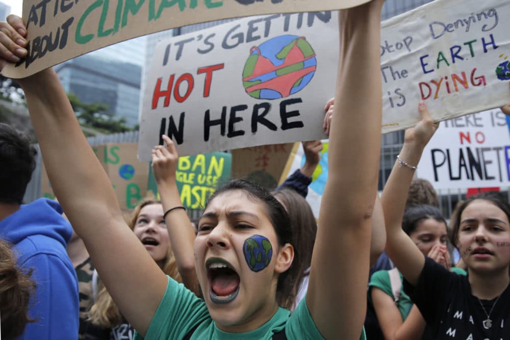 Hundreds of schoolchildren take part in a climate protest in Hong Kong. (Kin Cheung/AP)