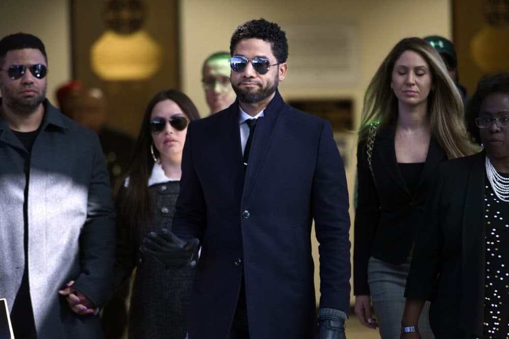 Actor Jussie Smollett gestures as he leaves Cook County Court after his charges were dropped Tuesday, March 26, 2019, in Chicago. (Paul Beaty/AP)