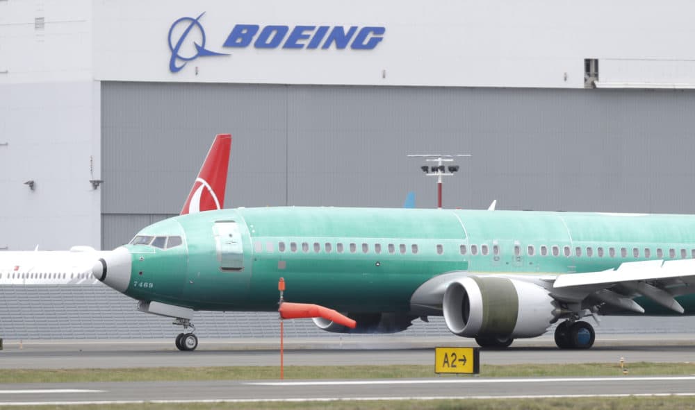 A Boeing 737 MAX 8 being built for Oman Air taxis past a Boeing hanger after landing at Boeing Field, Friday, March 22, 2019, in Seattle. In a blow for Boeing, Indonesia's flag carrier is seeking the cancellation of a multibillion dollar order for 49 of the manufacturer's 737 Max 8 jets, citing a loss of confidence after two crashes within five months. (Ted S. Warren/AP)