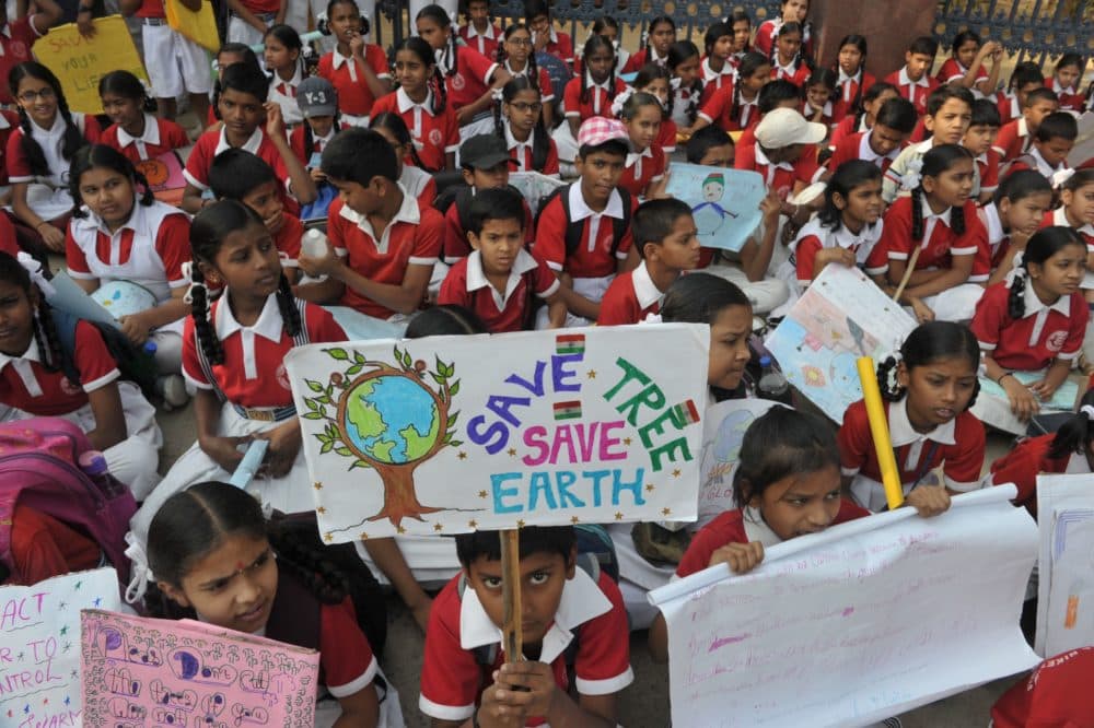 Indian school students hold placards as they take part in a protest against global warming in Hyderabad on March 15, 2019. (Noah Seelam/AFP/Getty Images)