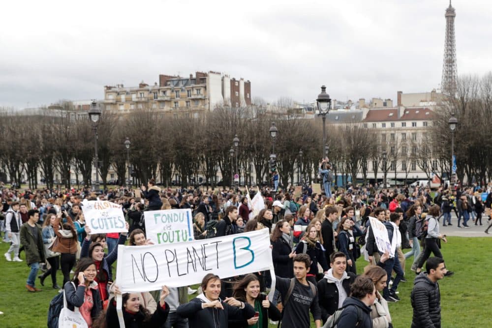 Youth take part in a demonstration against climate change near the Eiffel Tower in Paris, on March 15, 2019. Thomas Samson/AFP/Getty Images)