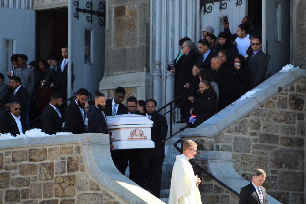 Pallbearers carry down the casket of 23-year-old Jassy Correia during her funeral in Dorchester on March 9, 2019. Correia was kidnapped late last month and found dead days later in Delaware. (Quincy Walters/WBUR)