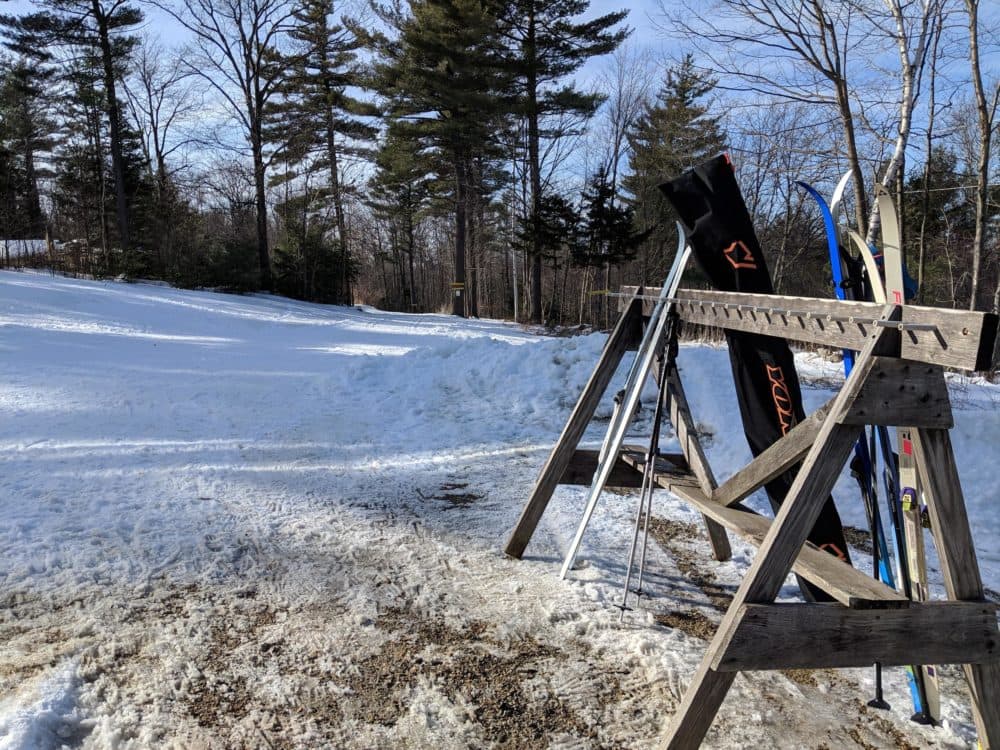 Frequent rains and thaws this winter have made it hard for ski areas like Windblown Cross Country Skiing and Snowshoeing in New Hampshire to maintain the base layer of snow necessary to groom ski trails. (Annie Ropeik/NHPR)