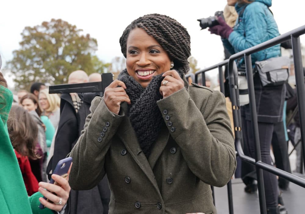 Then-Rep.-elect Ayanna Pressley, D-Mass., adjusts her coat after posing with other members of the freshman class of Congress for a group photo on Capitol Hill in Washington in November 2018. (Pablo Martinez Monsivais/AP)