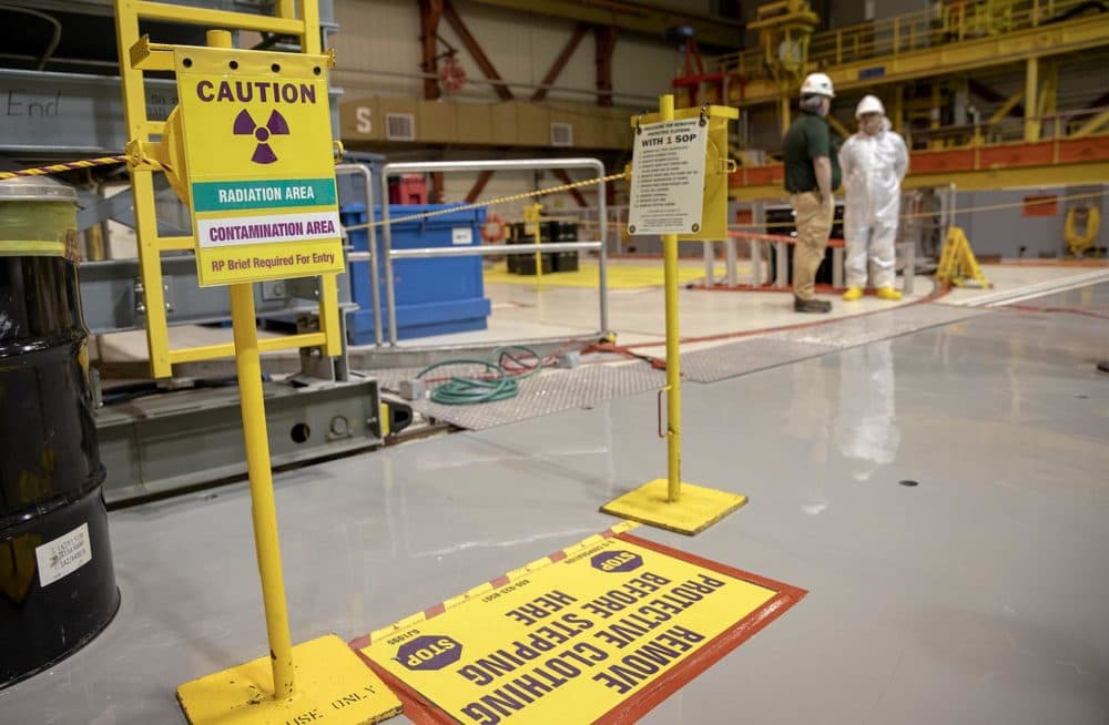 Signs warn of radiation and restrict access to working areas above the reactor at Pilgrim. (Robin Lubbock/WBUR)