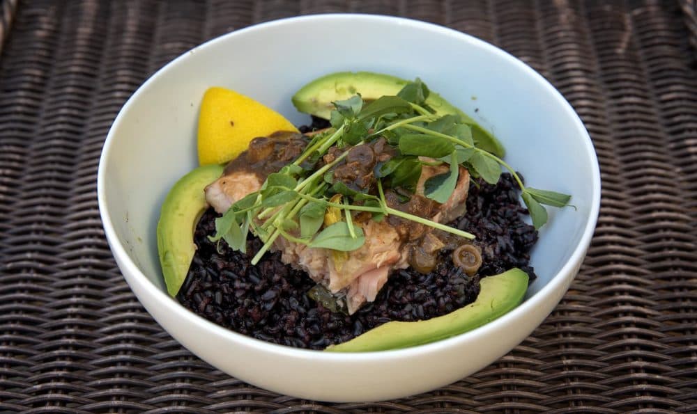 Broiled miso-ginger salmon bowl with rice, avocado, radishes and sprouts, from chef Kathy Gunst. (Robin Lubbock/WBUR)