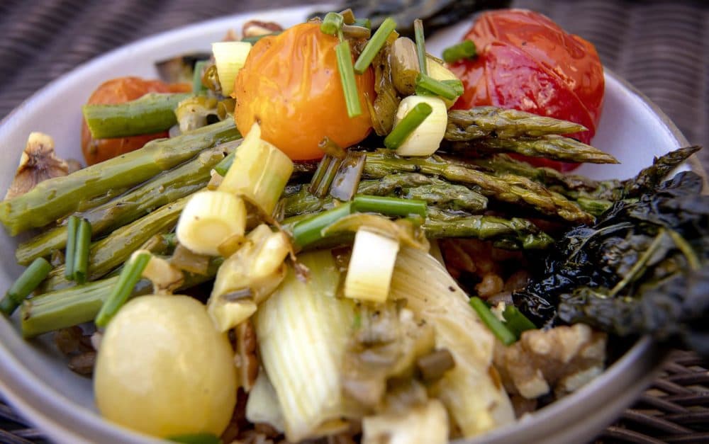 Chef Kathy Gunst's roasted spring vegetables on farro  with a lemon-chive vinaigrette. (Robin Lubbock/WBUR)