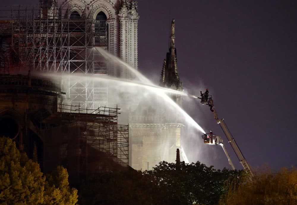 Firefighters battle to extinguish a giant fire that engulfed the Notre Dame Cathedral in Paris on Monday. (Courtesy of Maya Vidon-White)