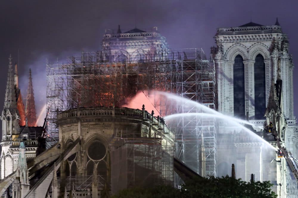 French President Emmanuel Macron vowed to rebuild the 13th-century building, which welcomes tens of millions of worshippers and tourists each year. (Courtesy of Maya Vidon-White)